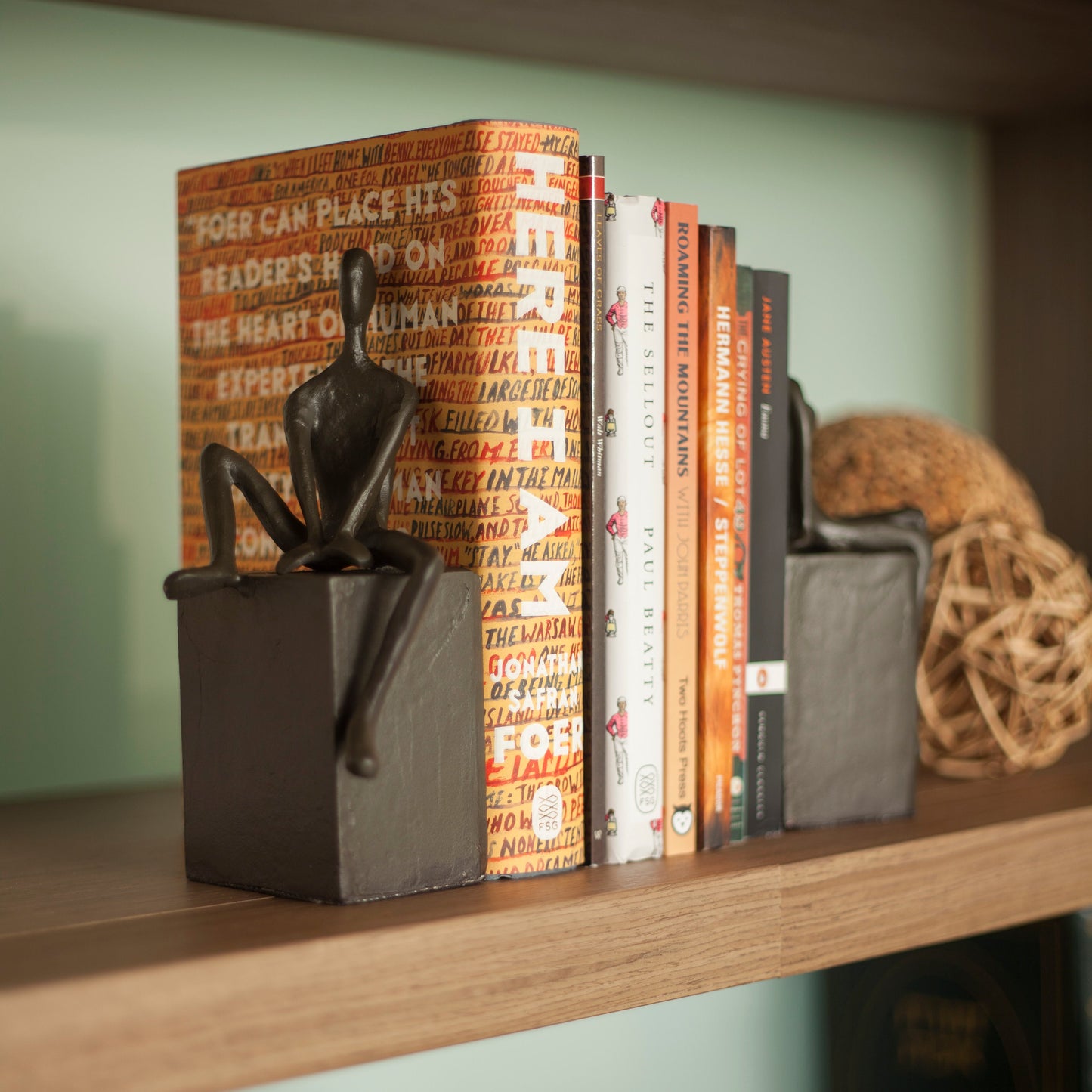 Bookend Set with Man and Woman Sitting on a Block