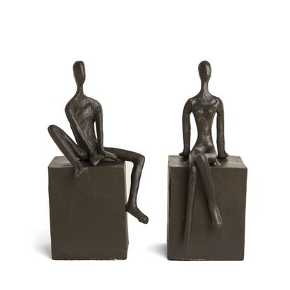 Bookend Set with Man and Woman Sitting on a Block