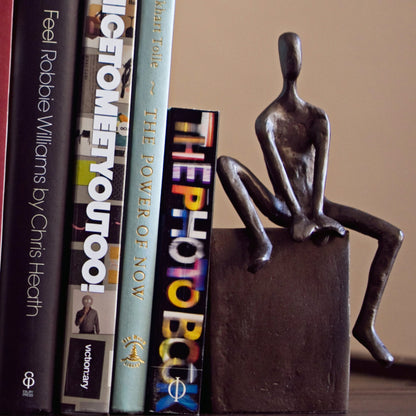 Bookend Set with Man and Woman Sitting on a Block